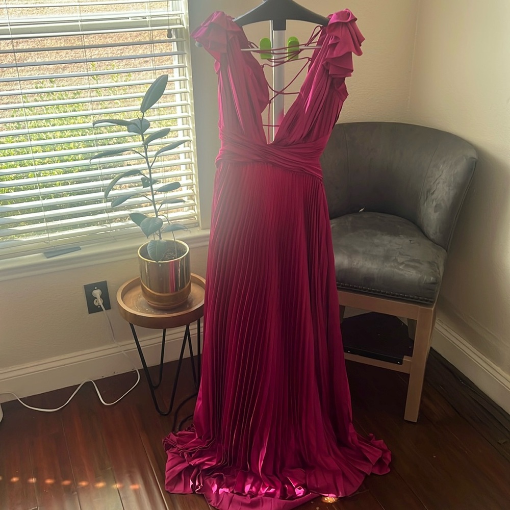 This pink fuchsia dress! It’s an ideal choice for prom, weddings, Etc.
